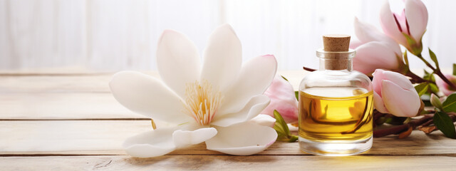 Obraz na płótnie Canvas bottle, jar with magnolia essential oil extract