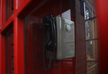 Old street. red phone booth Soviet times. Front view of old Russian public phones. Telephone of the...