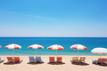 Foto op Aluminium Sunny beach landscape with striped umbrellas and lounging chairs © lermont51
