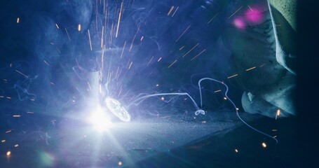 Welding Metal Parts At Steel Construction Industrial Workshop