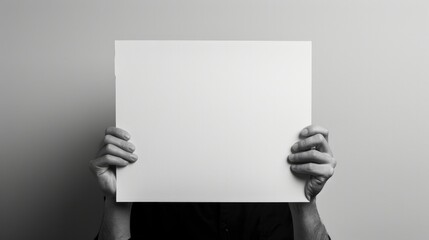 White black paper isolated on canvas with hands holding black and white - obrazy, fototapety, plakaty