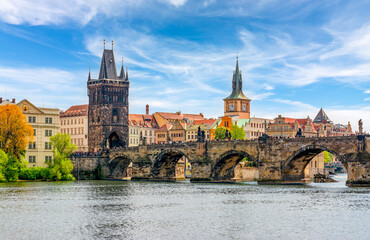 Fototapeta na wymiar Prague cityscape with Old Town bridge Tower and Charles bridge over Vltava river, Czech Republic