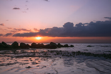 Gorgeous seascape with dramatic sky at sunset.