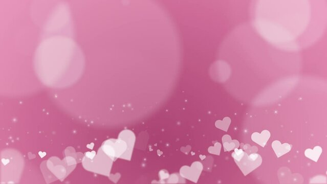 Pink romantic abstract background with round bokeh and bottom frame of hearts. Looped animation for Valentine's Day.