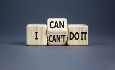 I can do it symbol. Concept word I can or can not do it on beautiful wooden cubes. Beautiful grey...