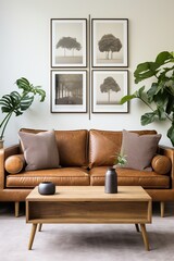 brown leather sofa with tree wall art in living room
