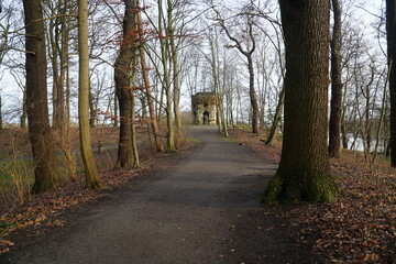 Forest path to the old witch tower of Hanover Marienwerder, Lower Saxony, Germany.