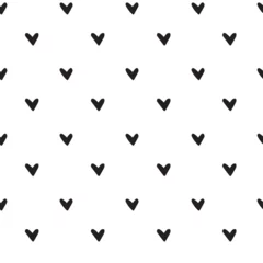 Hand-drawn doodle seamless pattern with hearts. Black and white. Cute Hand-drawn nursery cartoon doodle. Black shapes on a white background. Perfect for printing fabrics, packaging, clothes © Ripi Art