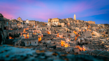 Naklejka premium Matera, Basilikata, Italia, Italy. Sasso, Sassi, Old Town, Sunset, Architecture, Buildings, Houses.