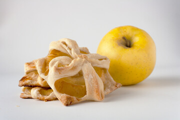 Apple buns lie on the table, copy space
