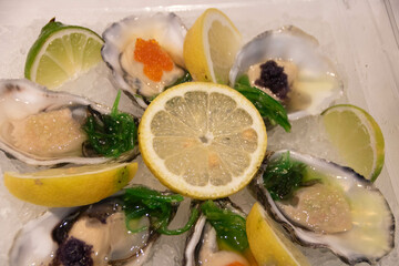 plate of raw oysters in the market of Porto