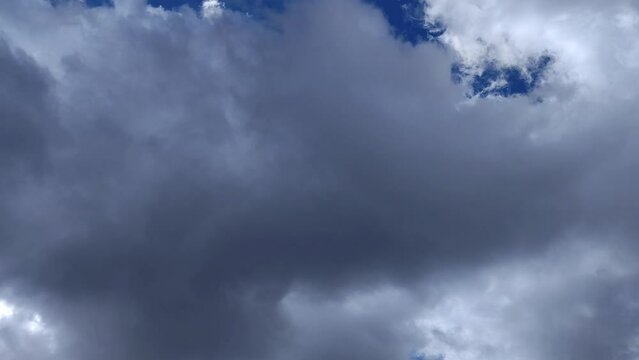 Sky with dark clouds gets darker but in the end the light appears