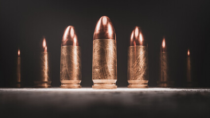 9mm bullets standing in light, CGI, 3D render
