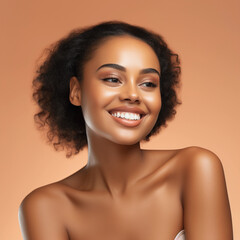 Beautiful smiling African American woman with smooth healthy skin portrait isolated background 