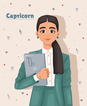 Astrology and zodiac signs concept. Capricorn. Business girl in a suit with a laptop