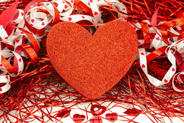 Valentine's day background with a big heart shape in center.