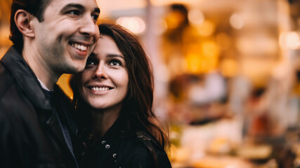 young beautiful couple in love in the city in the evening on a date. Dating of beautiful Caucasian people