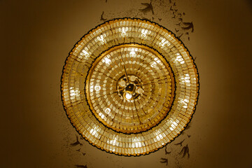 Designer chandelier with light bulbs,on the ceiling,bottom view