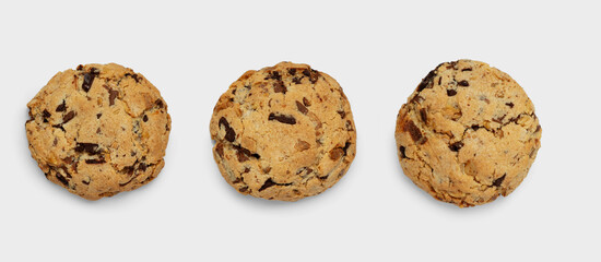 Cookies with nuts and chocolate on a white background