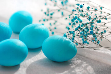 Close-up of beautiful blue Easter eggs. Easter decor. Selective focus