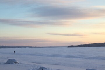 Coast on the city. Sunset over Storsön near Östersund in Sweden. Cold cold day.