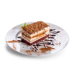 Slice of tiramisu cake with chocolate chips and mint, with transparent background and shadow
