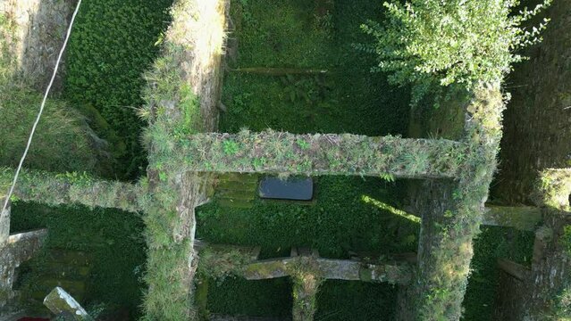 The Dilapidated Remains of an Uninhabited Structure in Zas, A Coruna, Spain - Aerial Drone Shot