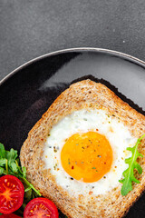fried egg toast scrambled yolk white protein breakfast food fresh healthy eating cooking appetizer meal food snack on the table copy space food background rustic top view