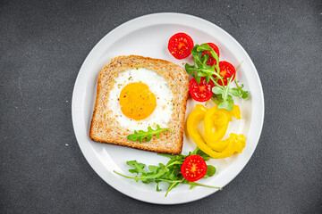 fried egg toast scrambled yolk white protein breakfast food fresh healthy eating cooking appetizer meal food snack on the table copy space food background rustic top view