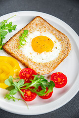 fried egg toast scrambled yolk white protein breakfast food fresh healthy eating cooking appetizer meal food snack on the table copy space food background rustic top view
