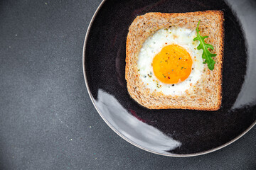 fried egg toast scrambled yolk white protein breakfast food fresh healthy eating cooking appetizer meal food snack on the table copy space food background rustic top view