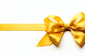 Large gold ribbon bow with long straight ribbon for banner, isolated on white background