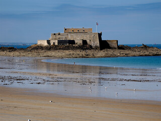 Fort National at Saint Malo in France accessible on foot at low tide. Saint-Malo is a French commune located in Brittany