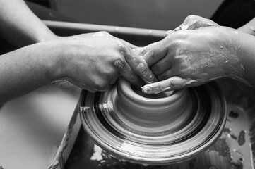 Black and white photo, clay, ceramics or hands in a design workshop working on an artistic cup or mug in a small business studio. Makes crafts in sculpture