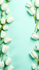 frame of tulip flowers with mint background