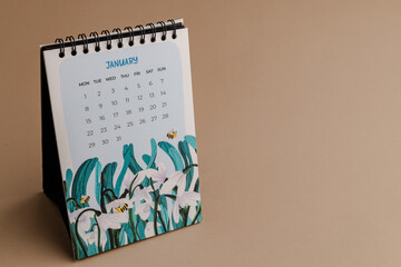 Calendar Year 2024 schedule. 2024 desk calender notepad on light gray background. Resolution, strategy, solution, goal, business and New Year holiday