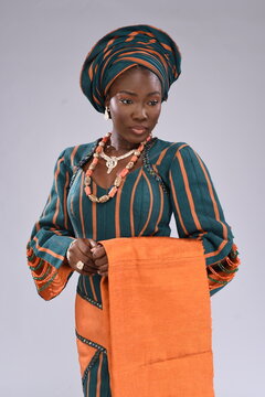 Young black African Nigerian Yoruba looking gorgeous wearing native attire  