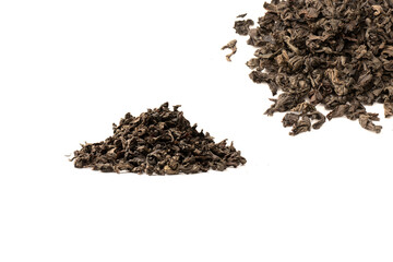 Dried tea leaves isolated on a white background.