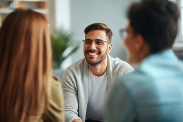 young therapist helping his patients in therapy
