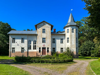 The old building of the Hunting Palace in Nowa Maziernia in the Lublin Voivodeship in Poland, currently a training center of the State Forests - obrazy, fototapety, plakaty