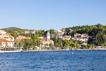 Fototapeta premium The promenade of Cavtat, Croatia, in the Dalmatia region. Unidentifiable people at the promenade.
