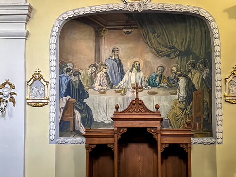 Hrubieszow, Poland, September 4, 2023: Sanctuary of Our Lady of Consolation, Sokalska in Hrubieszów, Poland. Fragment of the interior, fresco "The Last Supper" and confessional