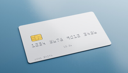 A blank white credit card with fake number and name lying on a blue table