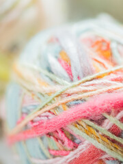 close up of knitting needles and yarn