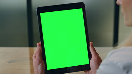 Woman fingers holding mockup tablet office close up. Lady boss reading computer