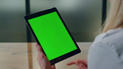 Lady finger tapping mockup tablet indoor closeup. Woman holding chromakey pad