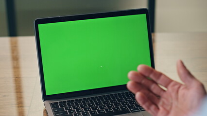 Man hands videocalling chromakey computer closeup. Video call conference office