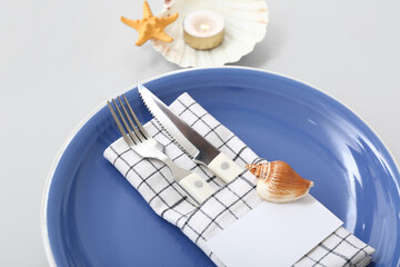 Beautiful table serving with marine decor on white background