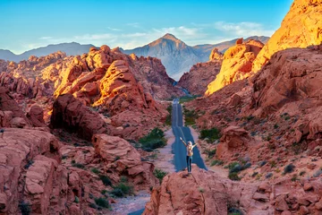 Gordijnen Hiker enjoying  View, Rock Formations, .Valley of Fire State Park..Las Vegas, Nevada, USA © Earth Pixel LLC.