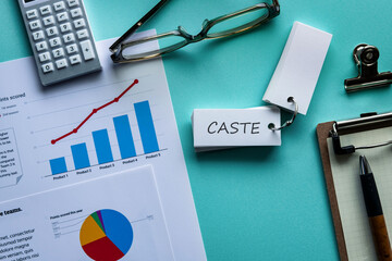 There is word card with the word CASTE. It is as an eye-catching image.